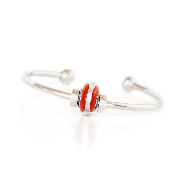 Champion bead on silver bangle bracelet